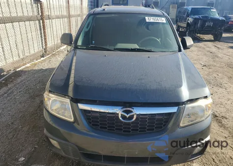 2009 Mazda Tribute Hybrid z USA, uszkodzony, nr VIN 4F2CZ49319KM07138